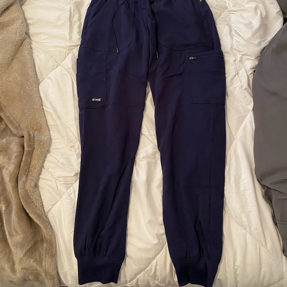 2 pairs of Navy blue greys anatomy scrub pants.